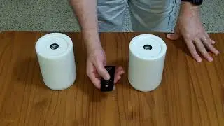 Remote Controlled light / extinguish candles with real flames