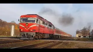 Diesel locomotive TEP70-0235 with a passenger train