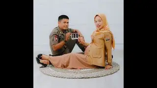 Pose Foto Hamil atau Maternity Model Pak Satpol PP Dengan Istri