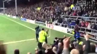 QPR fan on the sidelines gets punched in the face by a Birmingham fan
