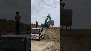ដឹកដីពីរណ្តៅ