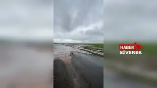 Siverek’te aşırı yağış nedeniyle otomobil dereye sürüklendi