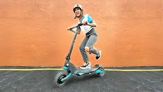 Her NEW e-Scooter is TOO FAST for me to keep up! - (VARLA Falcon ride & review!)