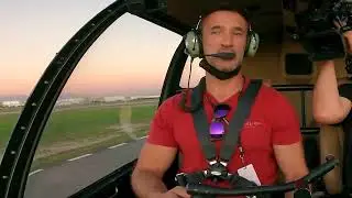 How do I actually hover in a Robinson helicopter