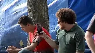 Baggy takes picture of the crowd for website and ends up getting into a fight