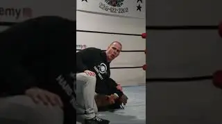 Pro wrestling catch wrestling top wrist lock into takeover